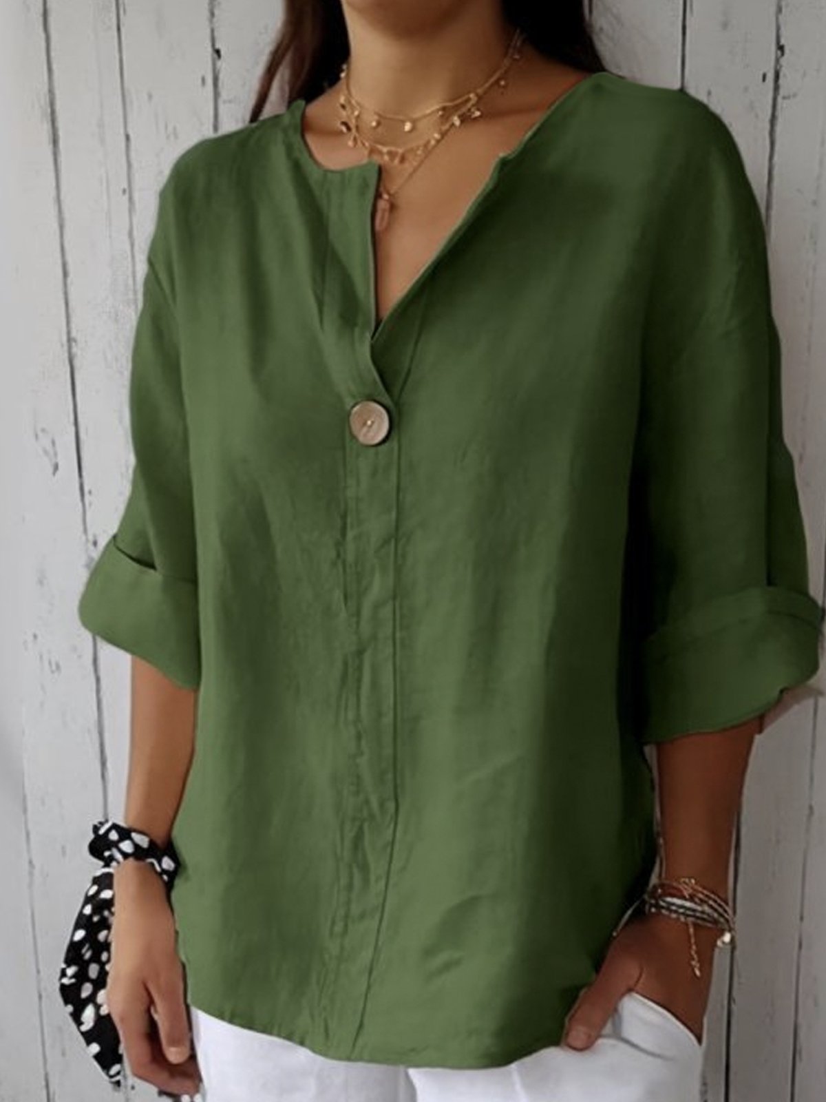 Blusa holgada con escote en V