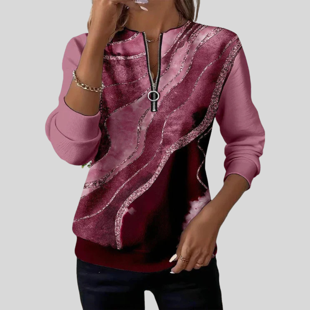 Blusa de punto con cremallera y estampado