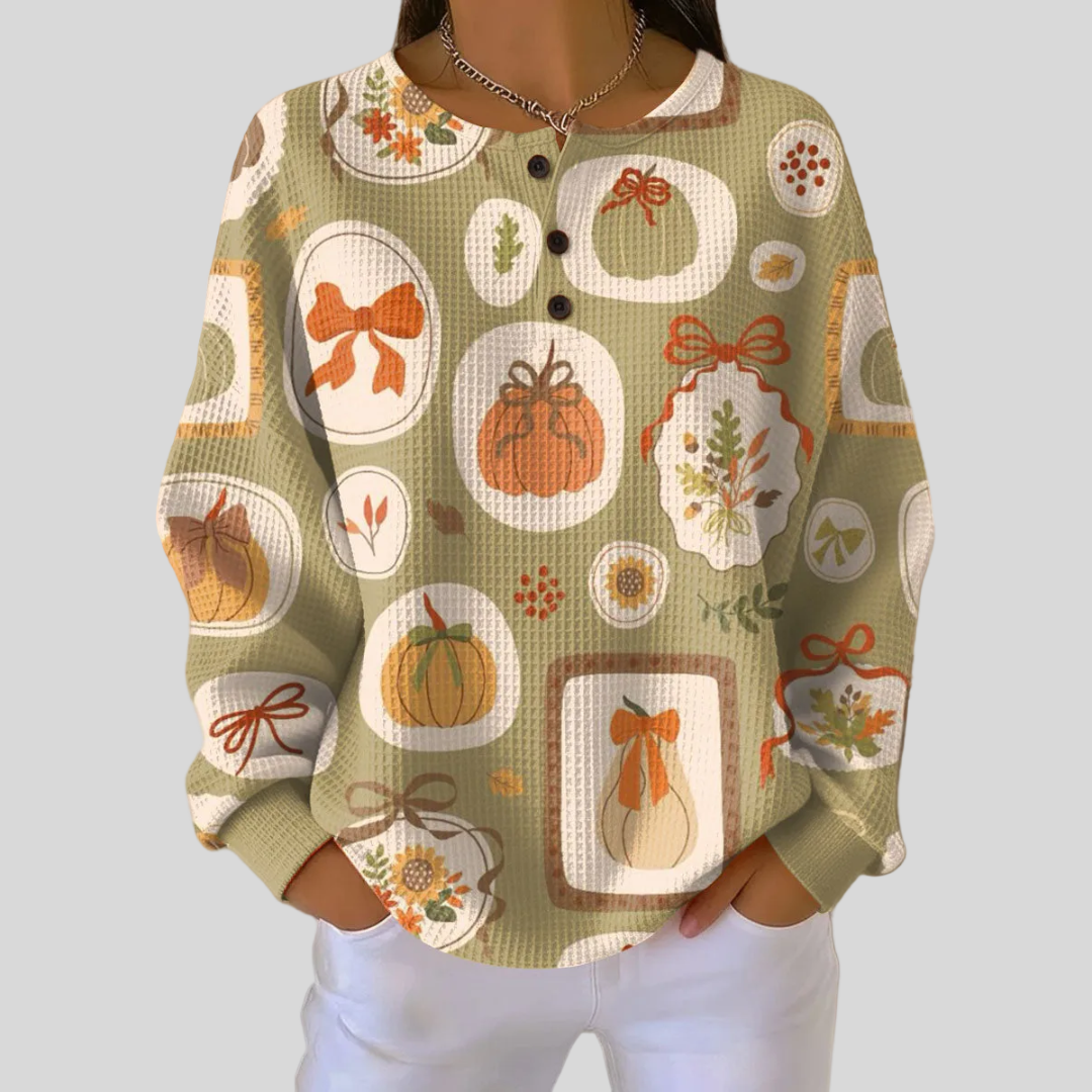 Jersey de punto con estampado otoñal y botones