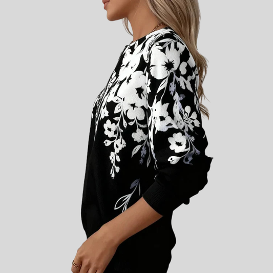 Blusa de punto con estampado floral y cremallera