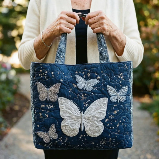 Bolso acolchado con mariposas plateadas
