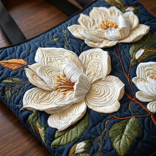 Bolso acolchado con magnolias