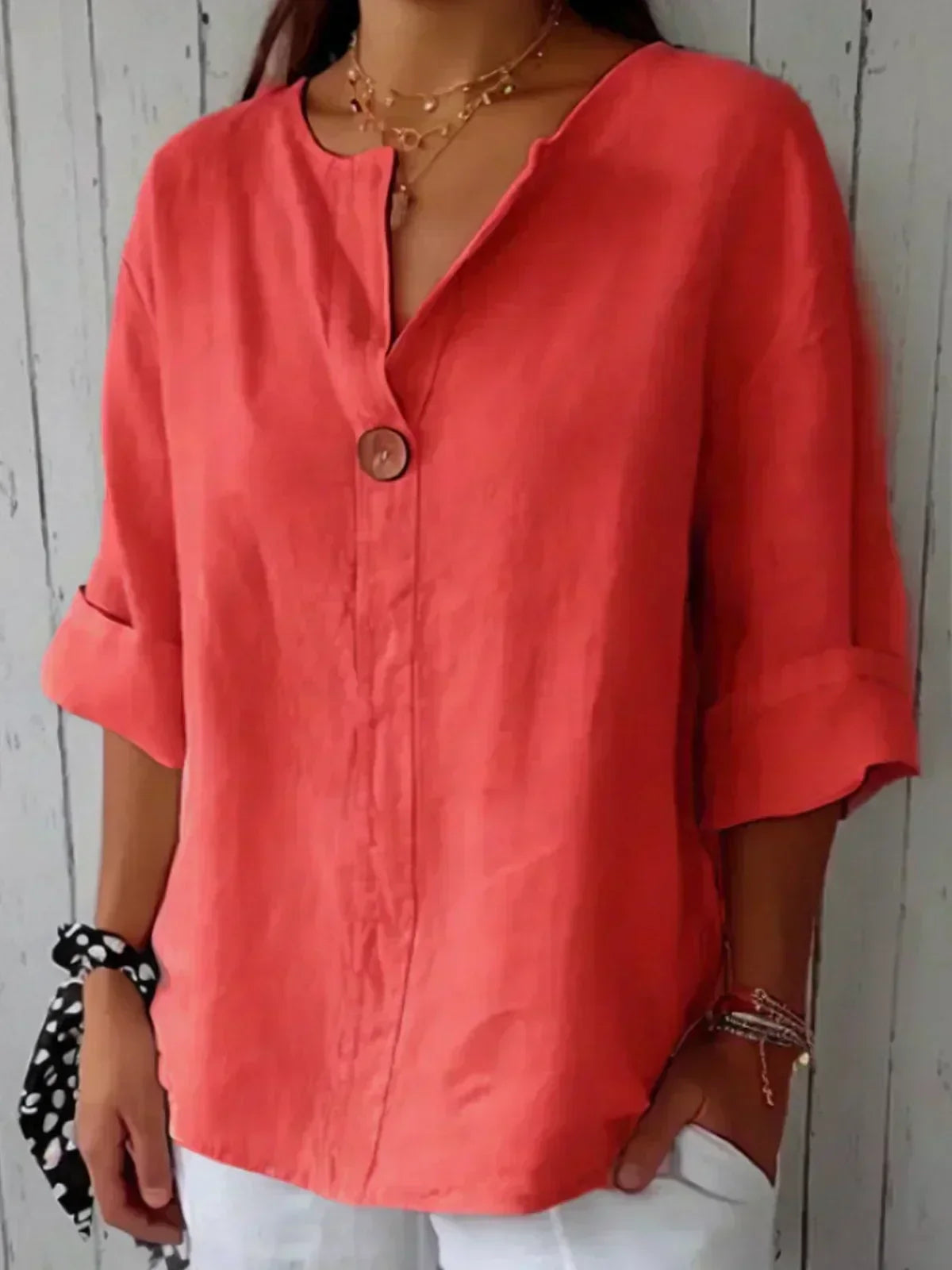 Blusa holgada con escote en V