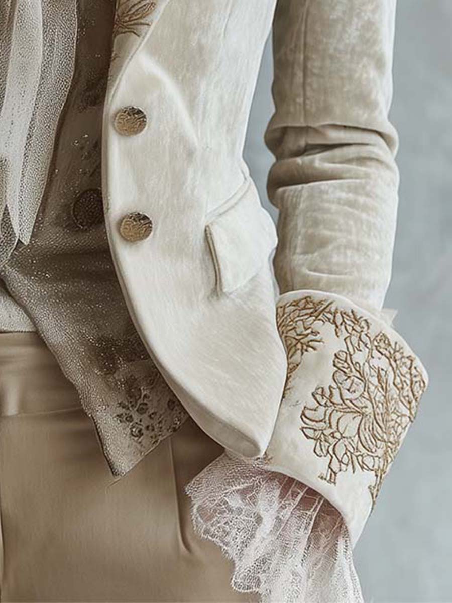 Blazer sastre con bordado floral dorado
