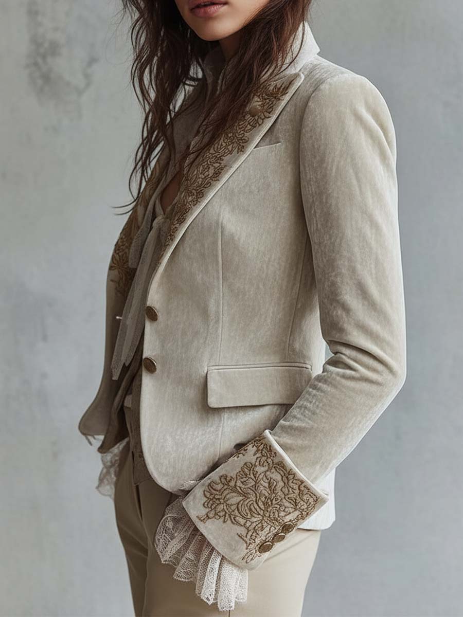 Blazer sastre con bordado floral dorado