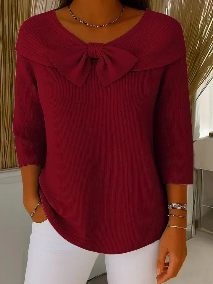 Jersey de punto con lazo en cuello redondo