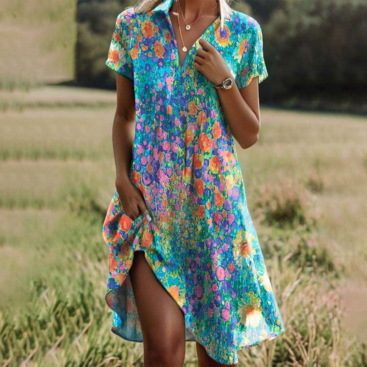 Vestido midi con escote en V y detalle drapeado
