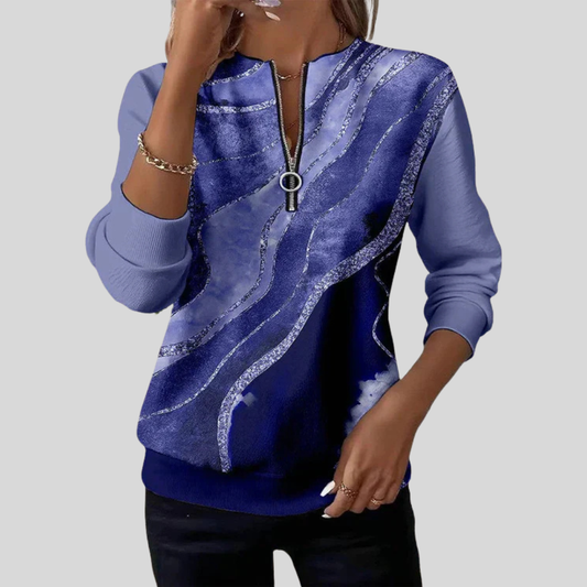 Blusa de punto con cremallera y estampado