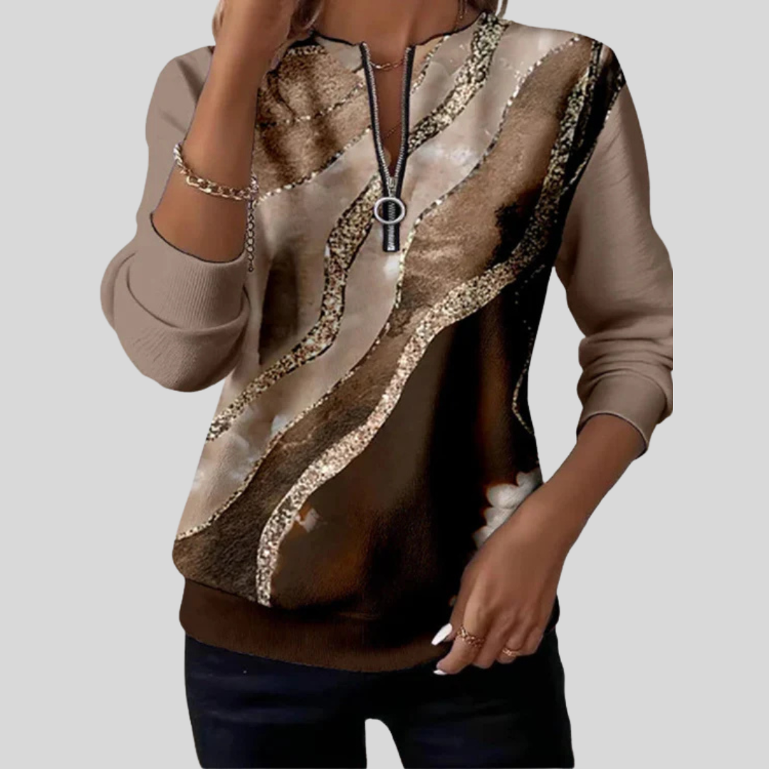 Blusa de punto con cremallera y estampado