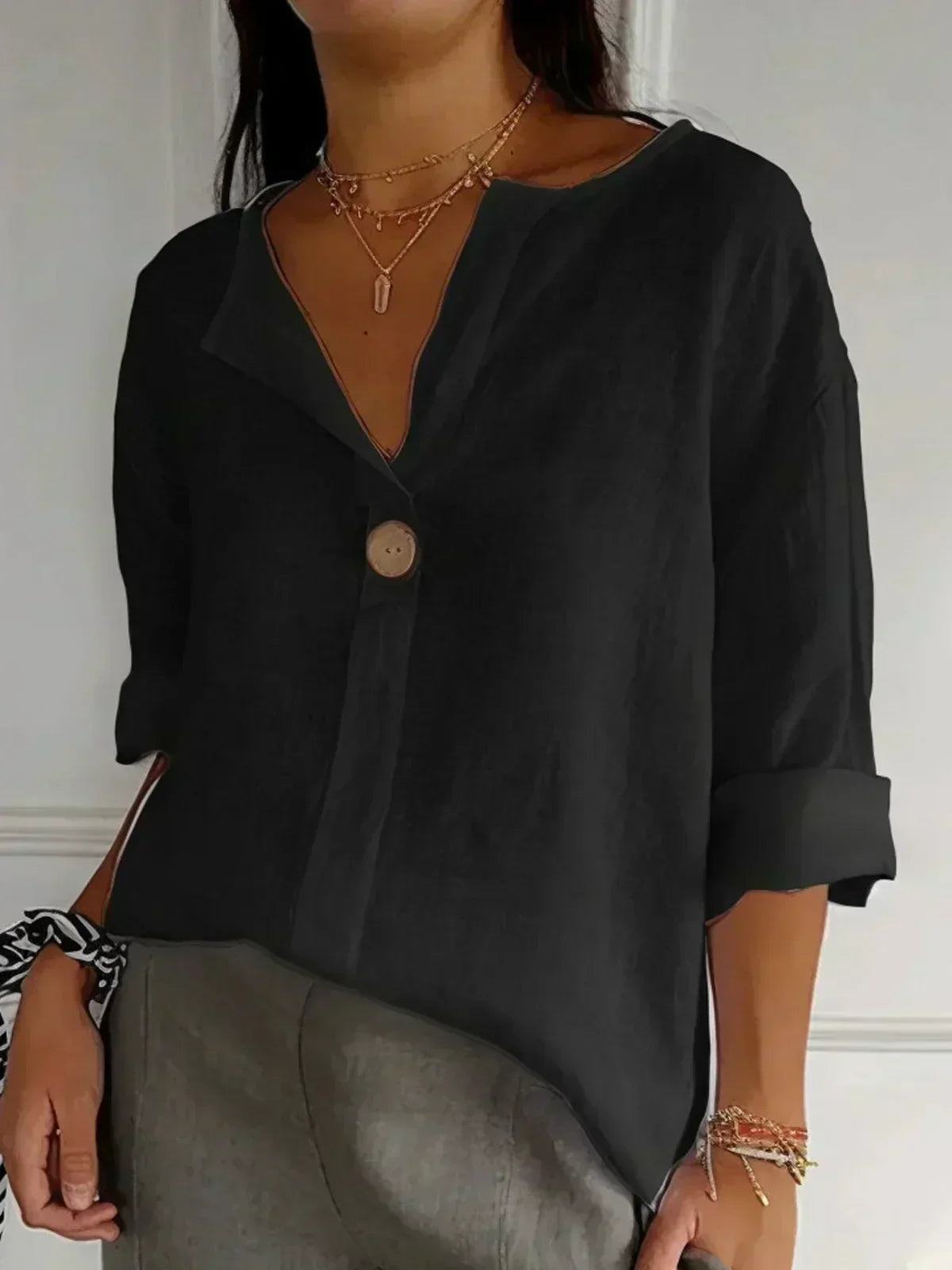 Blusa holgada con escote en V
