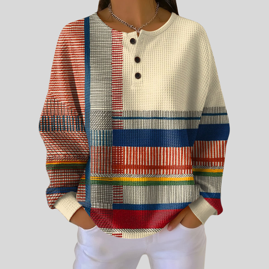 Blusa de punto con rayas y botones
