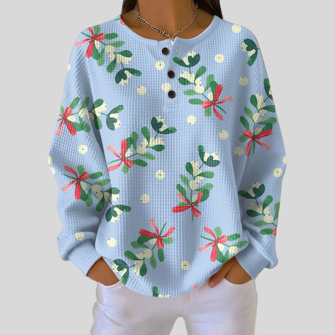 Jersey de punto con estampado floral navideño