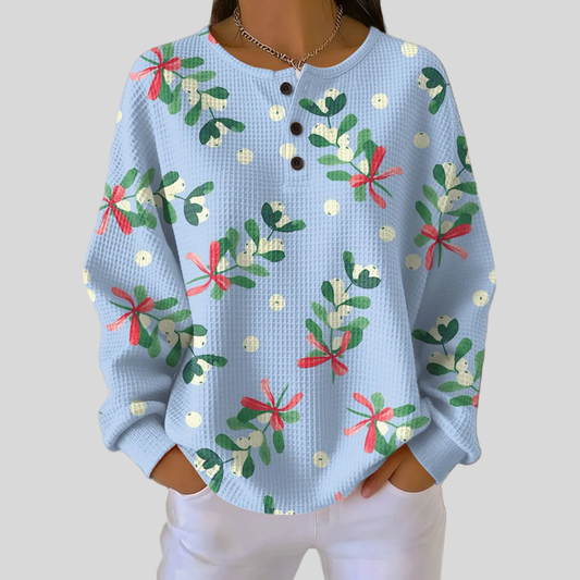 Jersey de punto con estampado floral navideño
