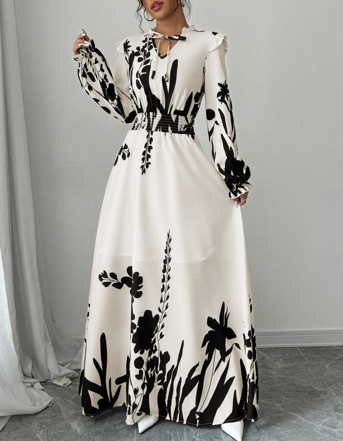 Vestido largo floral con manga larga