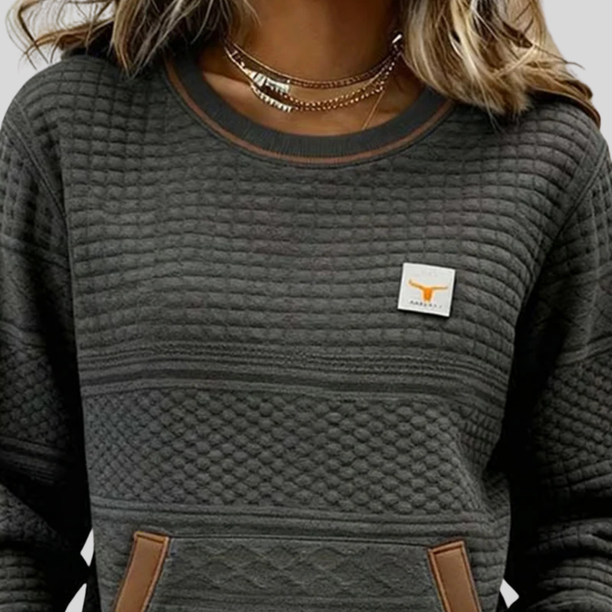 Jersey de punto con bolsillo y detalles en contraste