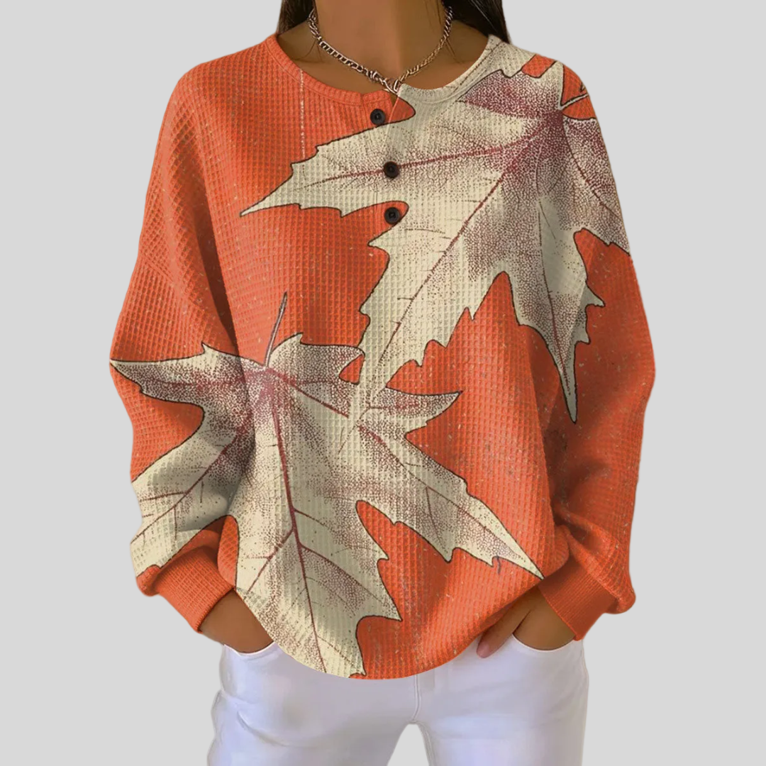 Jersey de punto con hojas estampadas