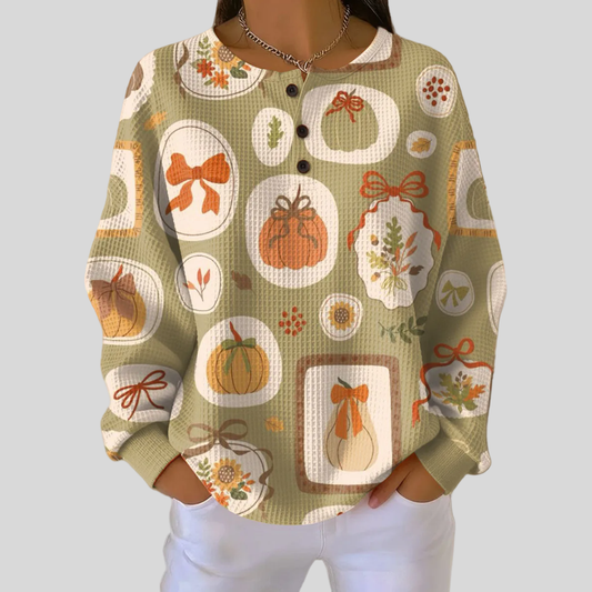 Jersey de punto con estampado otoñal y botones