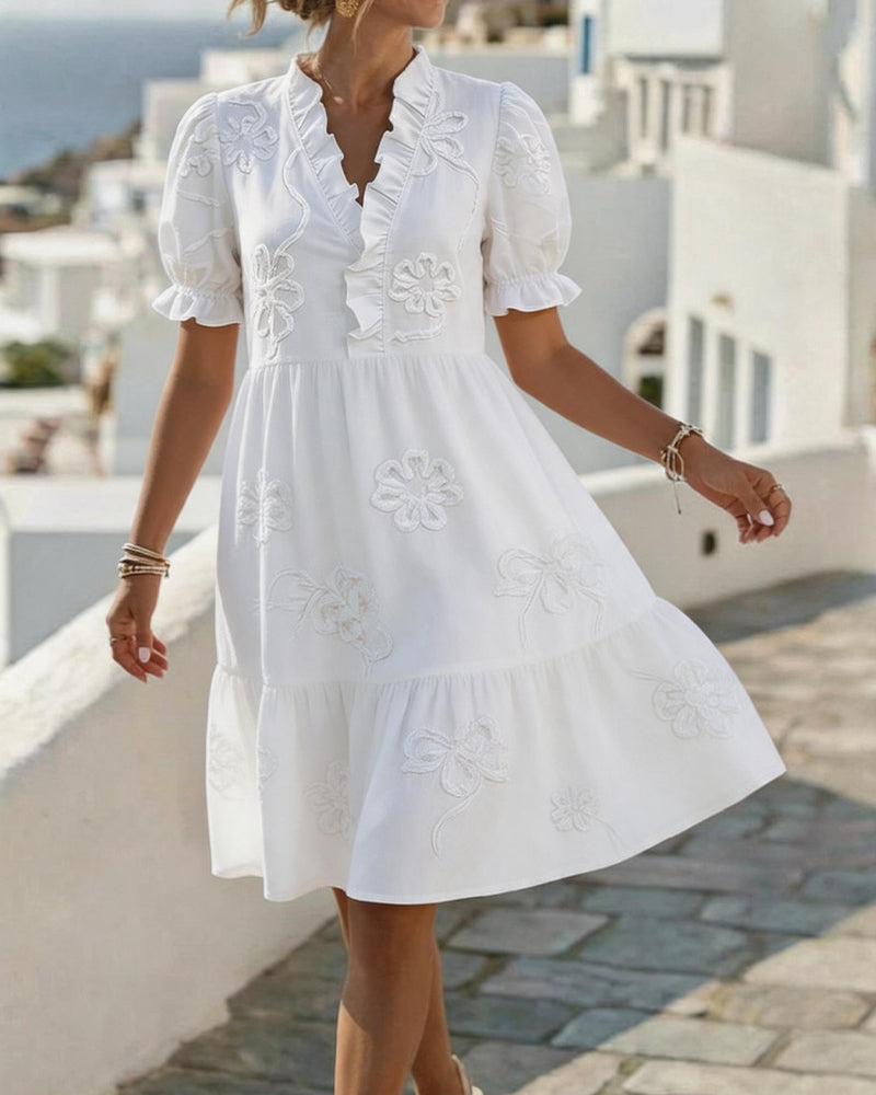 Vestido midi con bordado floral