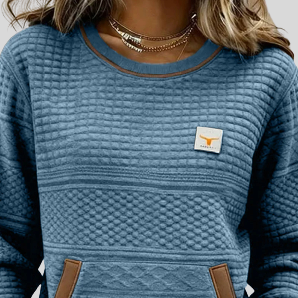 Jersey de punto con bolsillo y detalles en contraste
