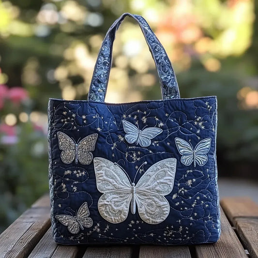 Bolso acolchado con mariposas plateadas