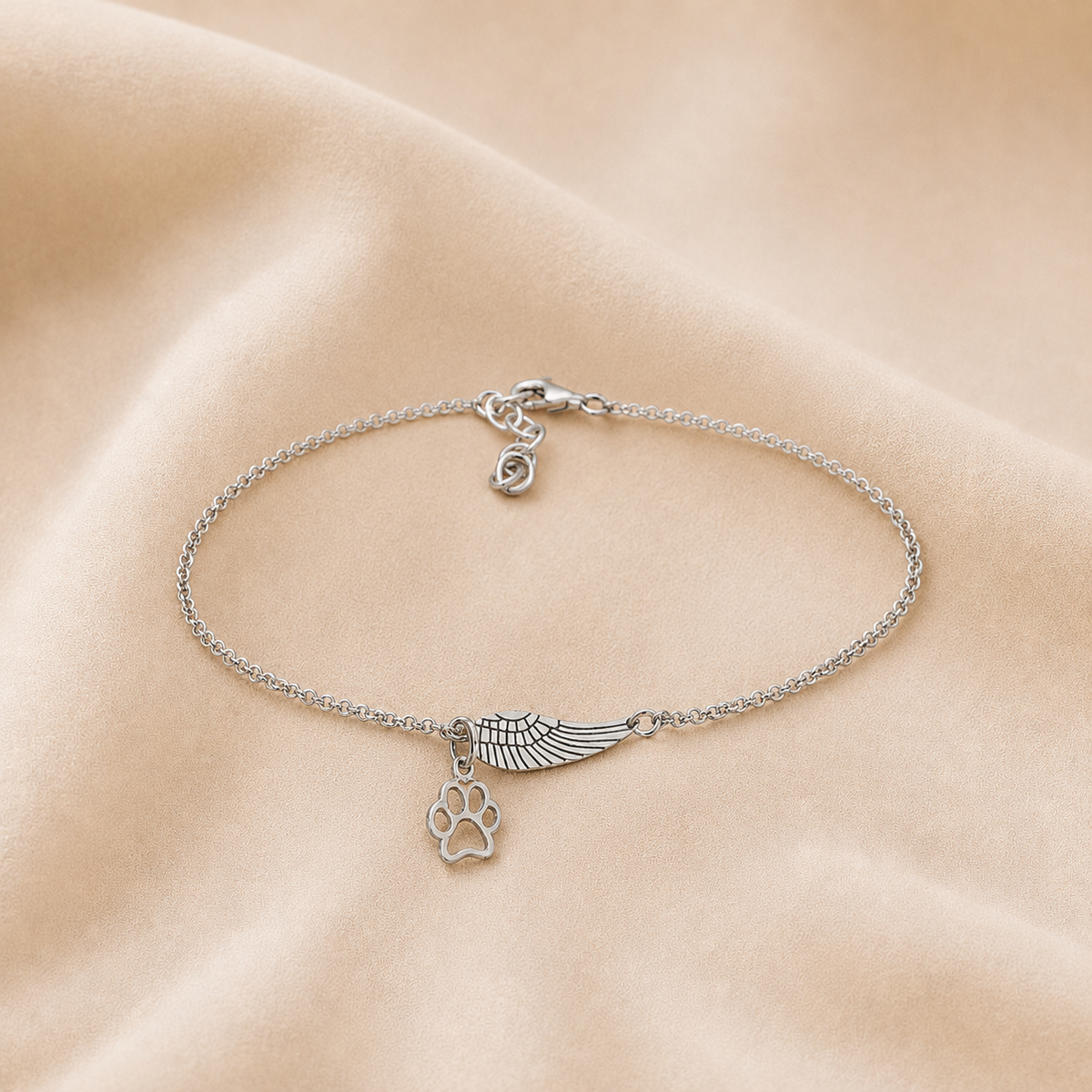 Pulsera con ala de ángel y huella de patita