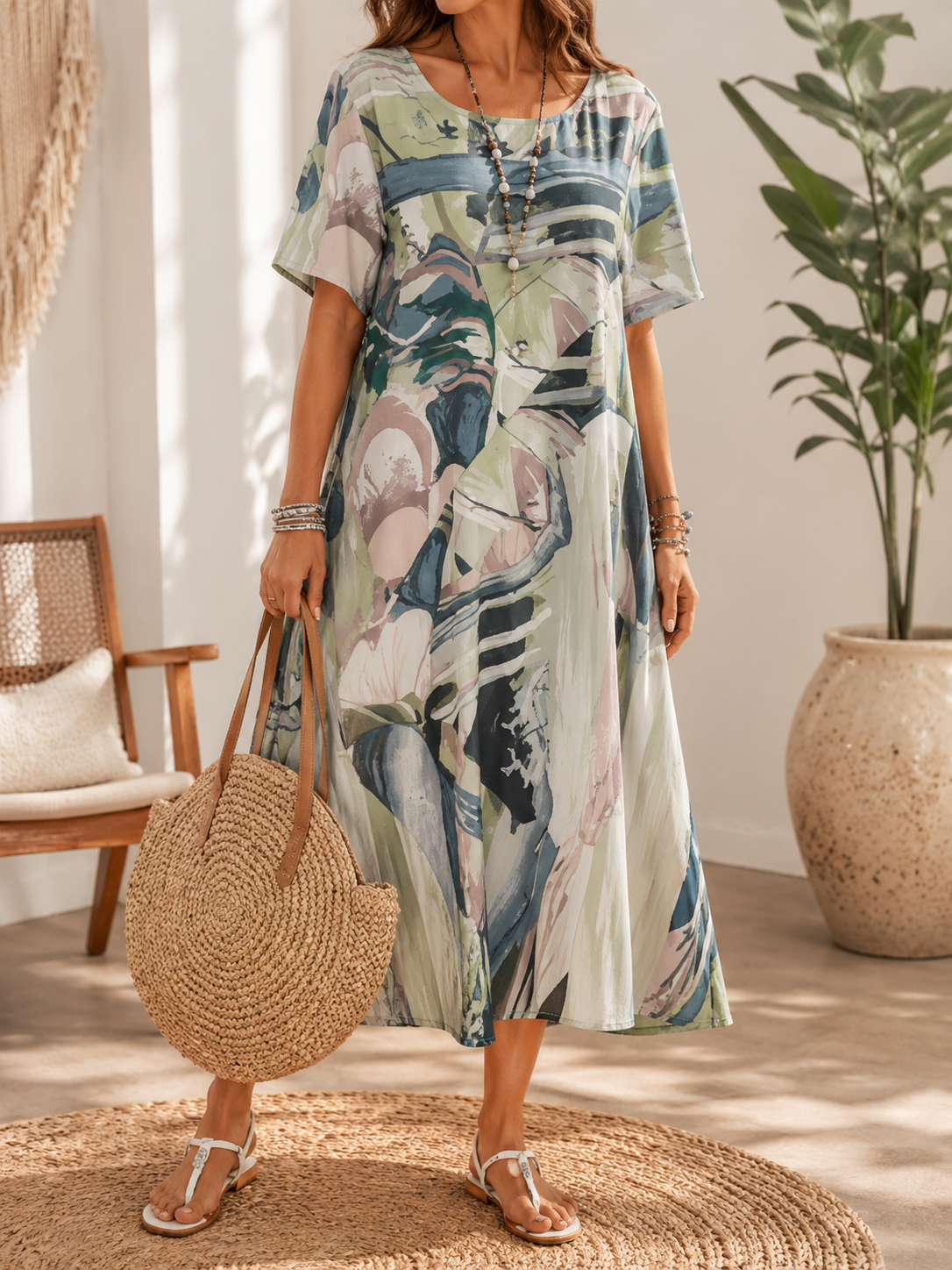 Vestido midi fluido con estampado abstracto