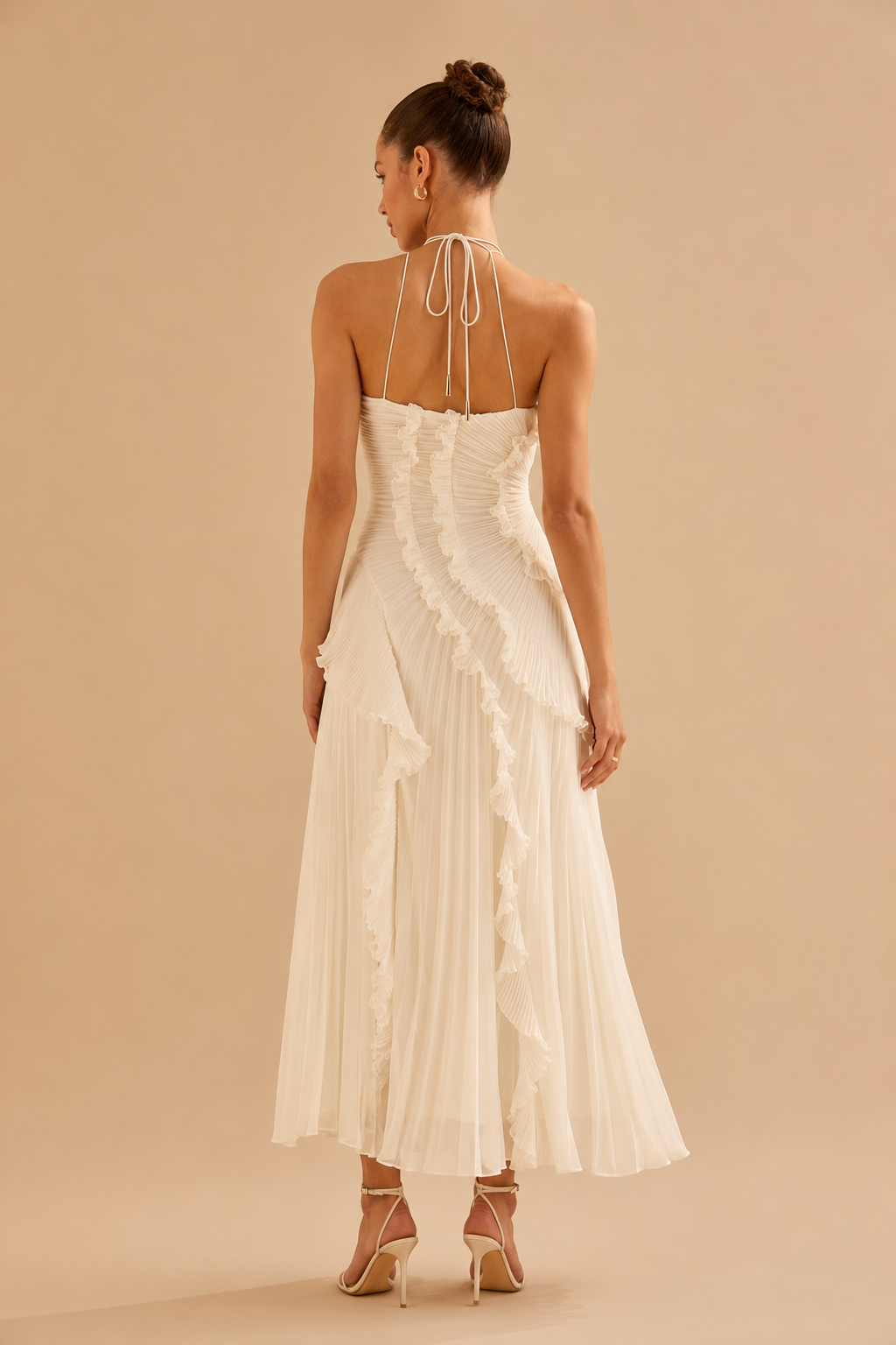 Vestido plisado con volantes