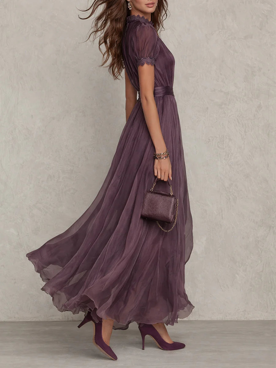 Vestido midi plisado con mangas abullonadas
