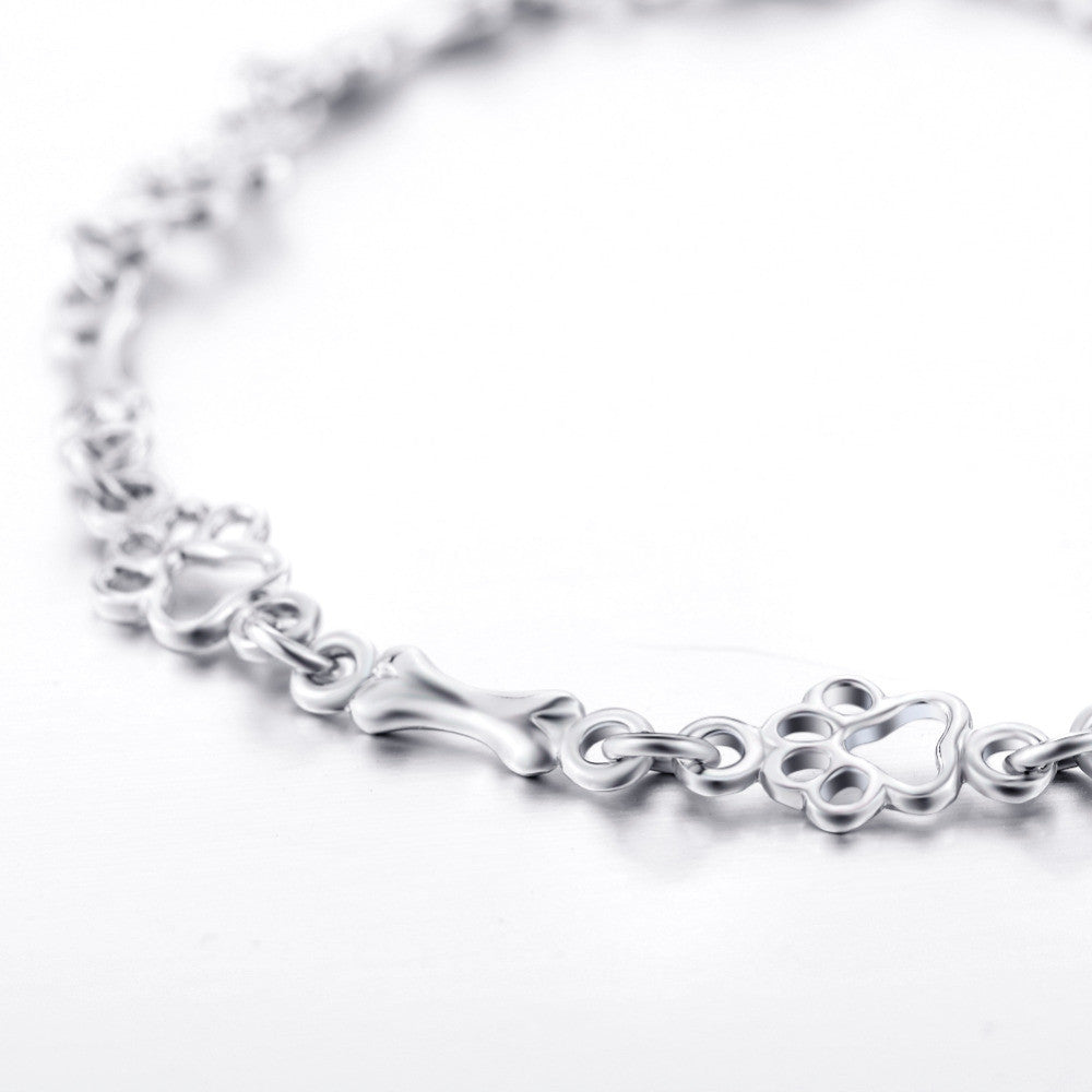 Pulsera de plata con detalles de perro