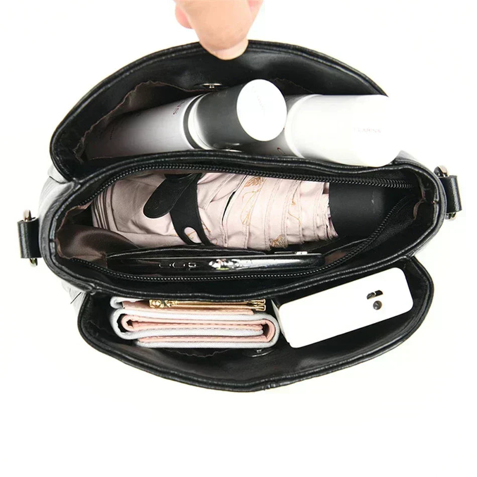 Bolsa bordada de microfibra con correa crossbody