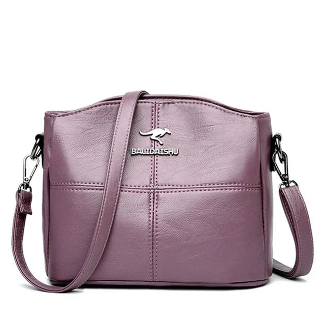 Bolsa bordada de microfibra con correa crossbody