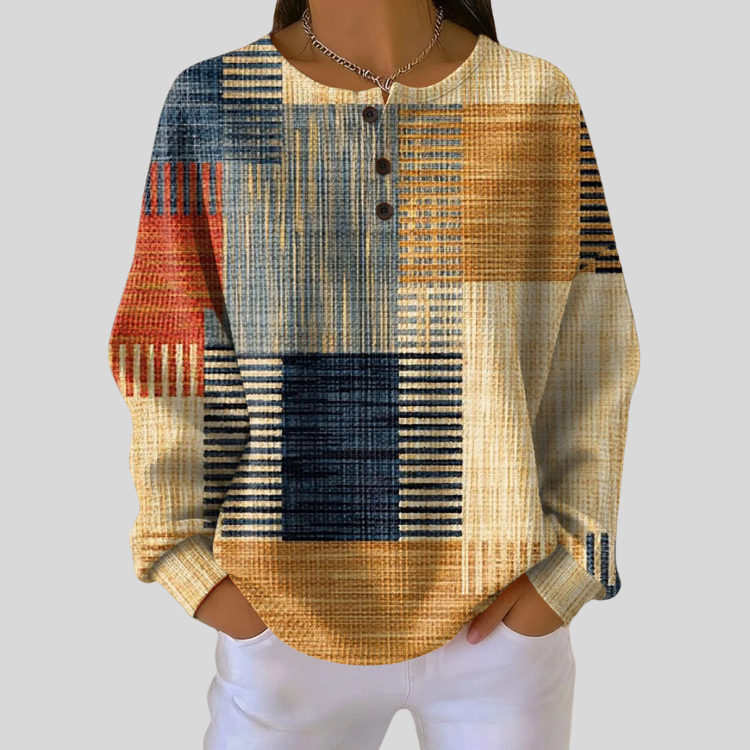 Blusa de punto con estampado geométrico patchwork