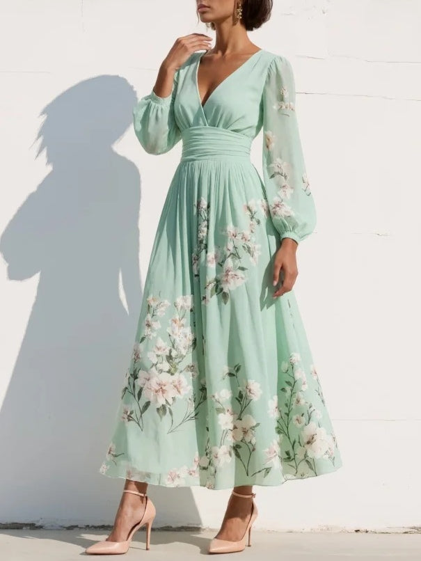 Vestido midi con mangas abullonadas y flores