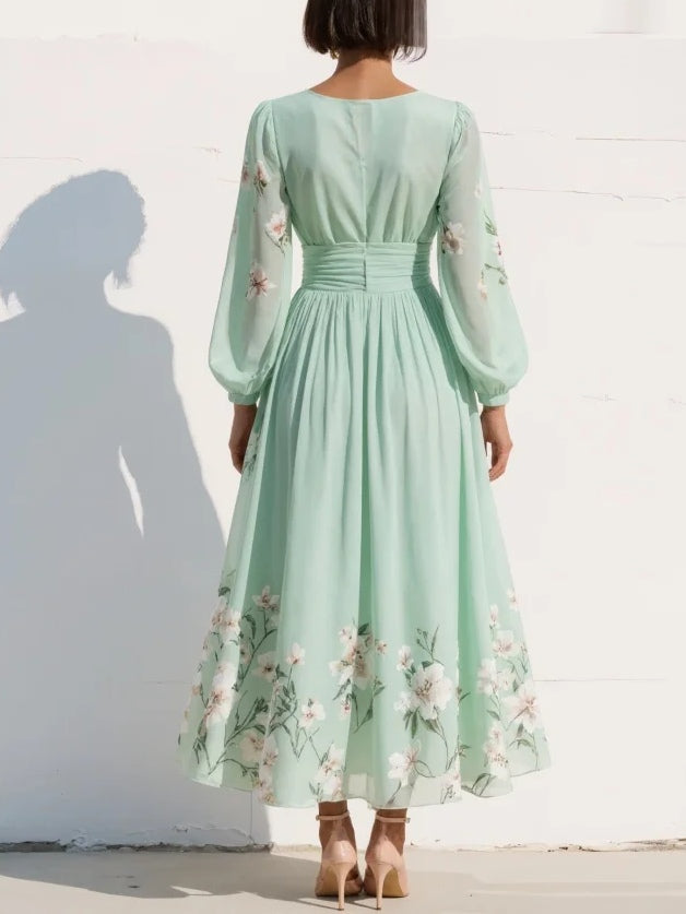 Vestido midi con mangas abullonadas y flores