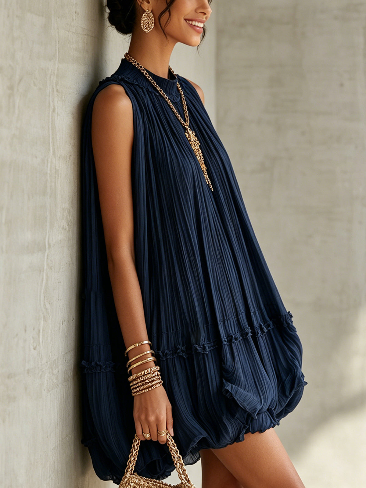 Vestido midi plisado con volantes