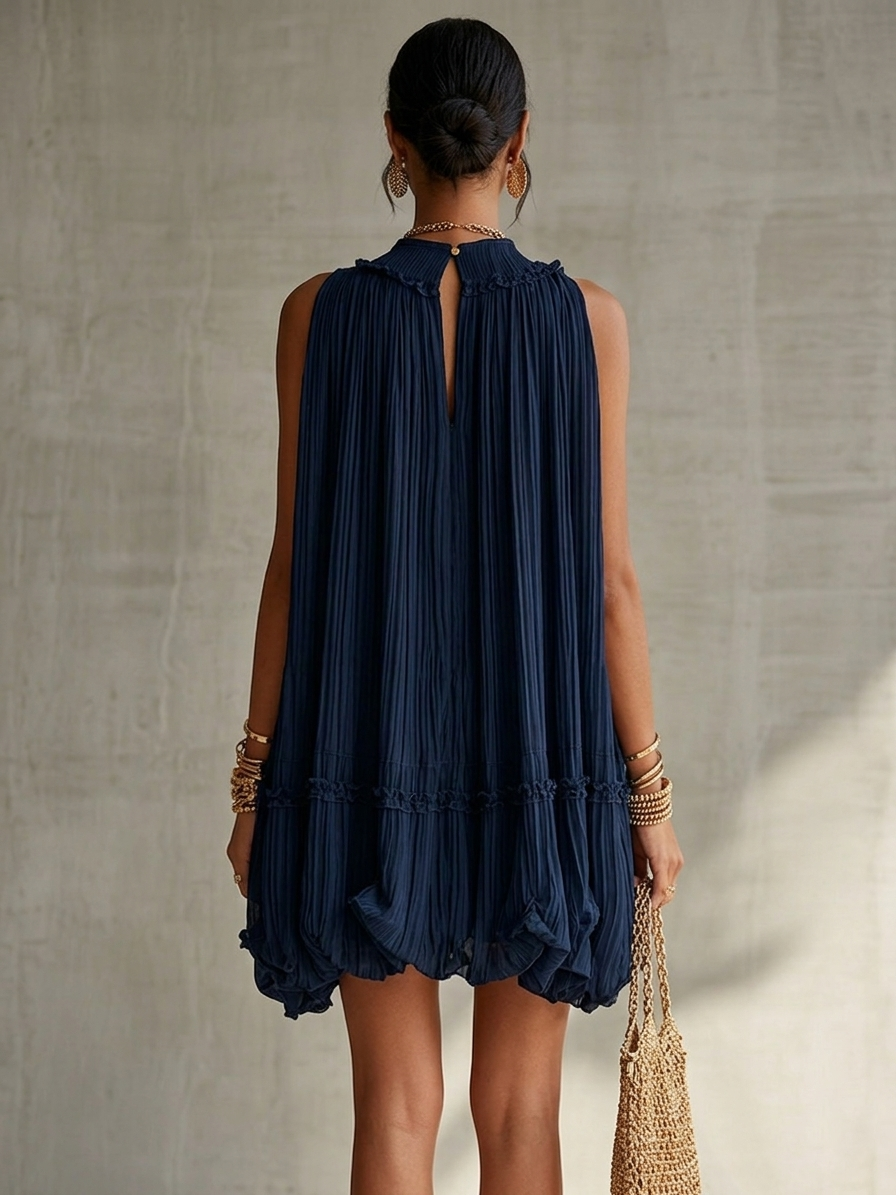 Vestido midi plisado con volantes