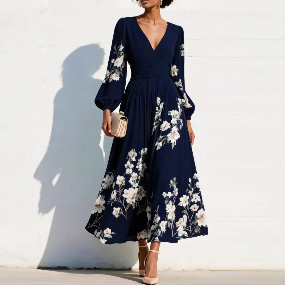 Vestido midi con mangas abullonadas y flores