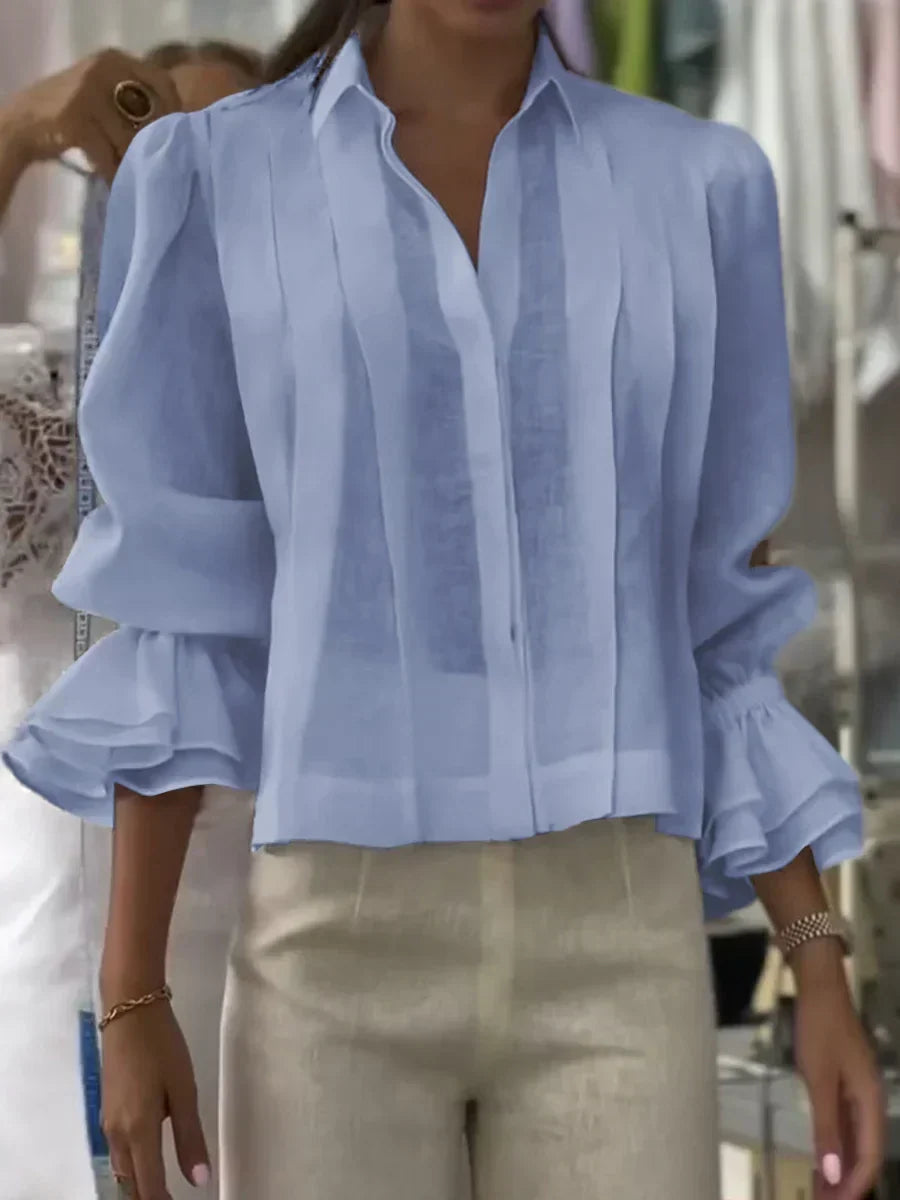 Blusa de algodón plisada elegante