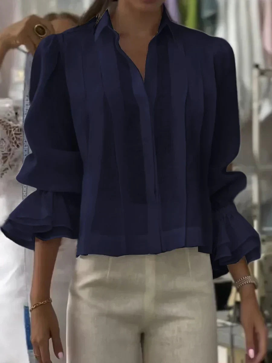 Blusa de algodón plisada elegante