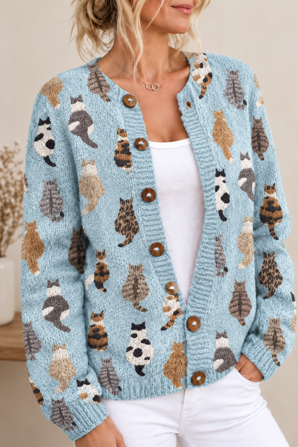 Cárdigan de punto con gatos estampados