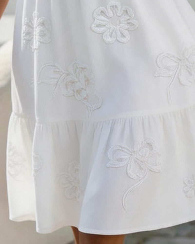 Vestido midi con bordado floral