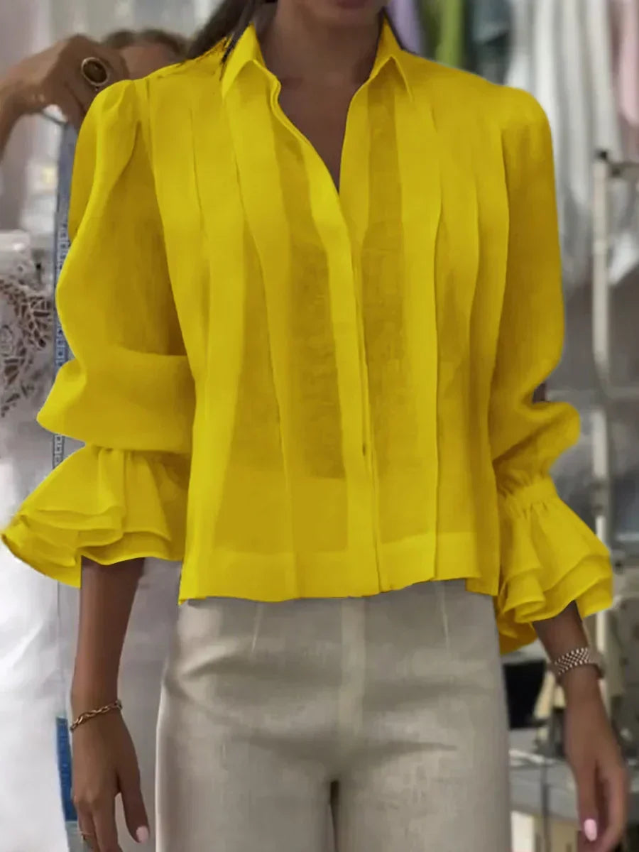 Blusa de algodón plisada elegante
