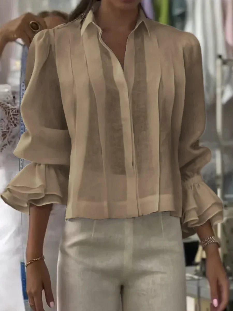 Blusa de algodón plisada elegante
