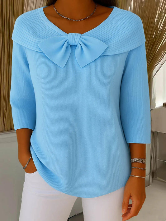 Jersey de punto con lazo en cuello redondo