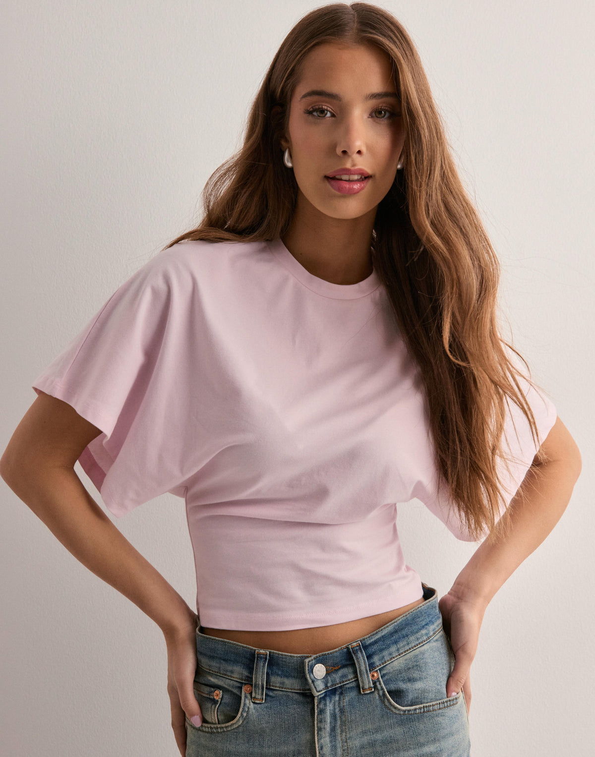 Top ajustado con mangas anchas
